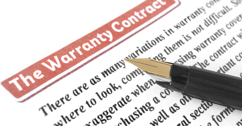 Warranty contract paper with pen