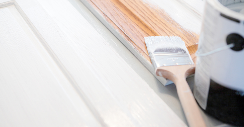 Cabinet doors brushed with white paint.