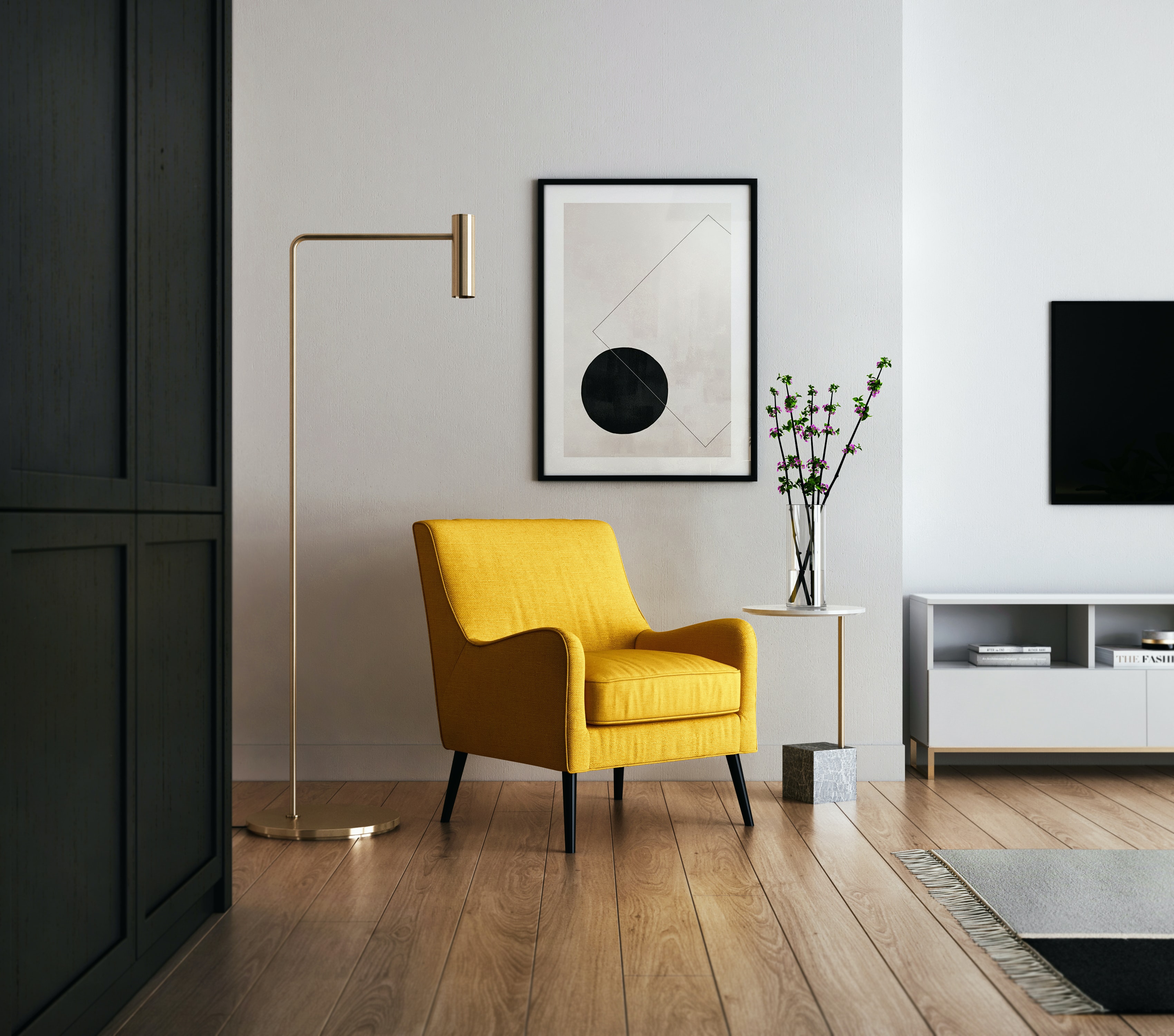 Living room with light grey walls and a bright yellow chair.